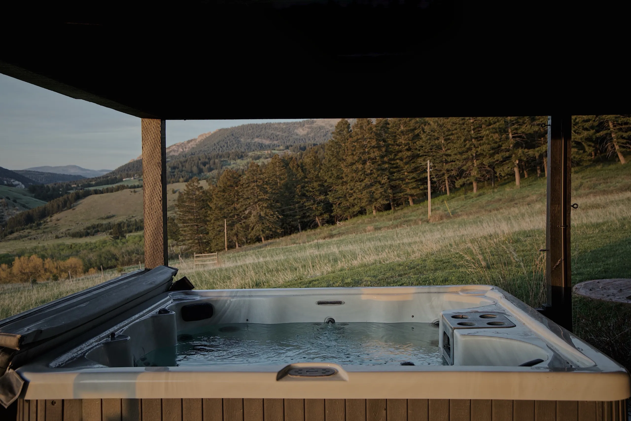 Hot tub with expansive views of the mountains and treeline