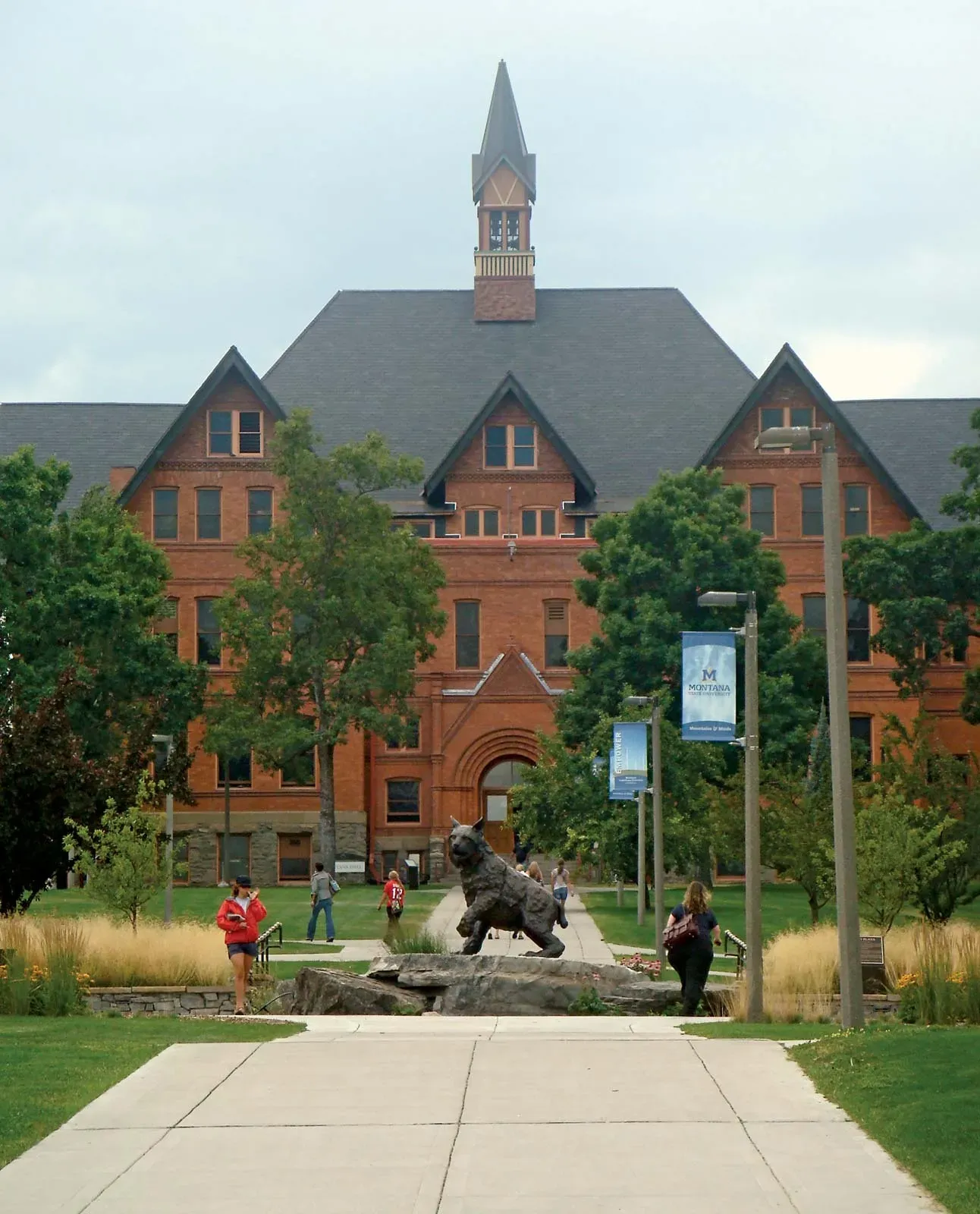 Montana Hall and the Bobcat statue at Montana State University